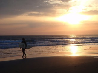 Surfer at Sunset at La Terriere Vendee